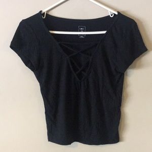 Small black, low cut with zig-zag patterned tee
